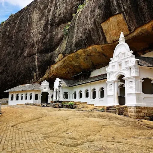 Dambulla Cave Temple Buddha statues golden interior Sri Lanka