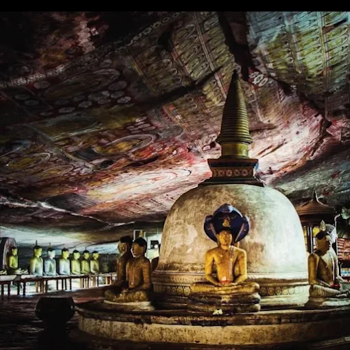 Inside Dambulla Cave Temple ancient Buddhist murals ceiling paintings